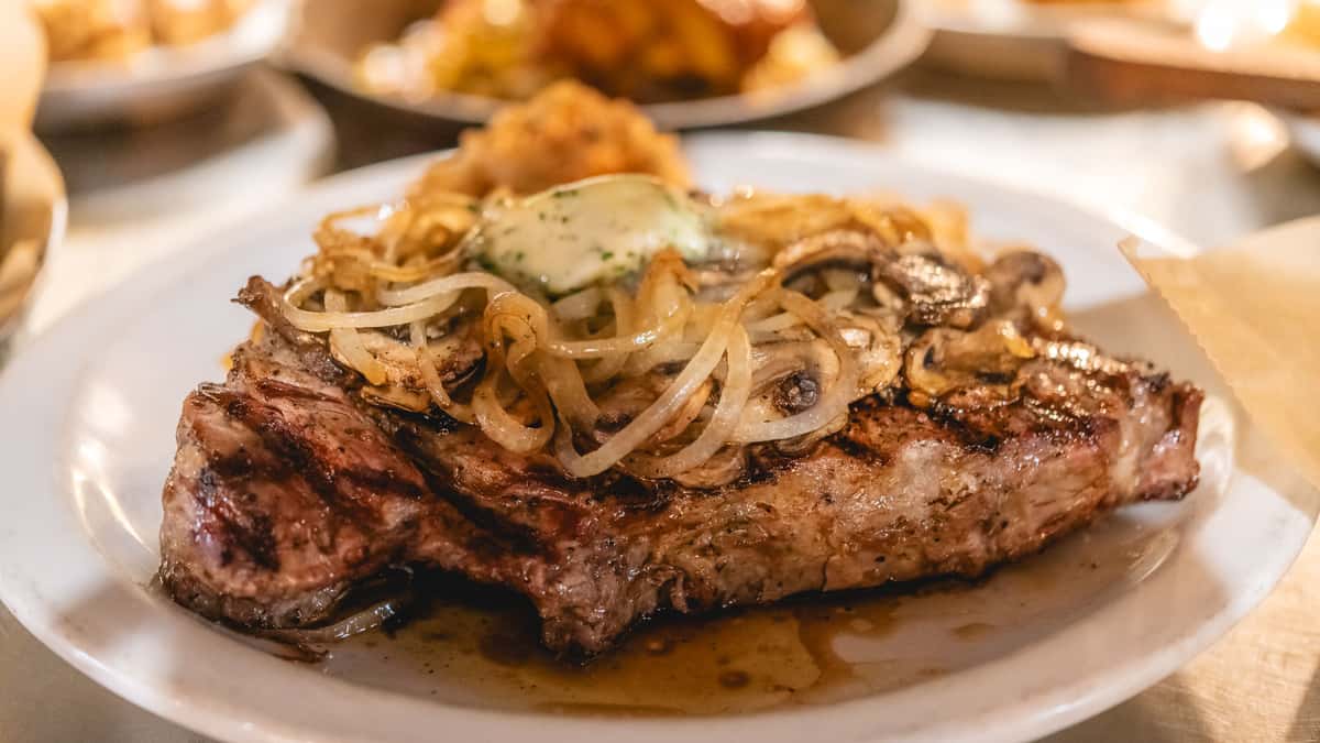 gibbs_strip steak with grilled onions