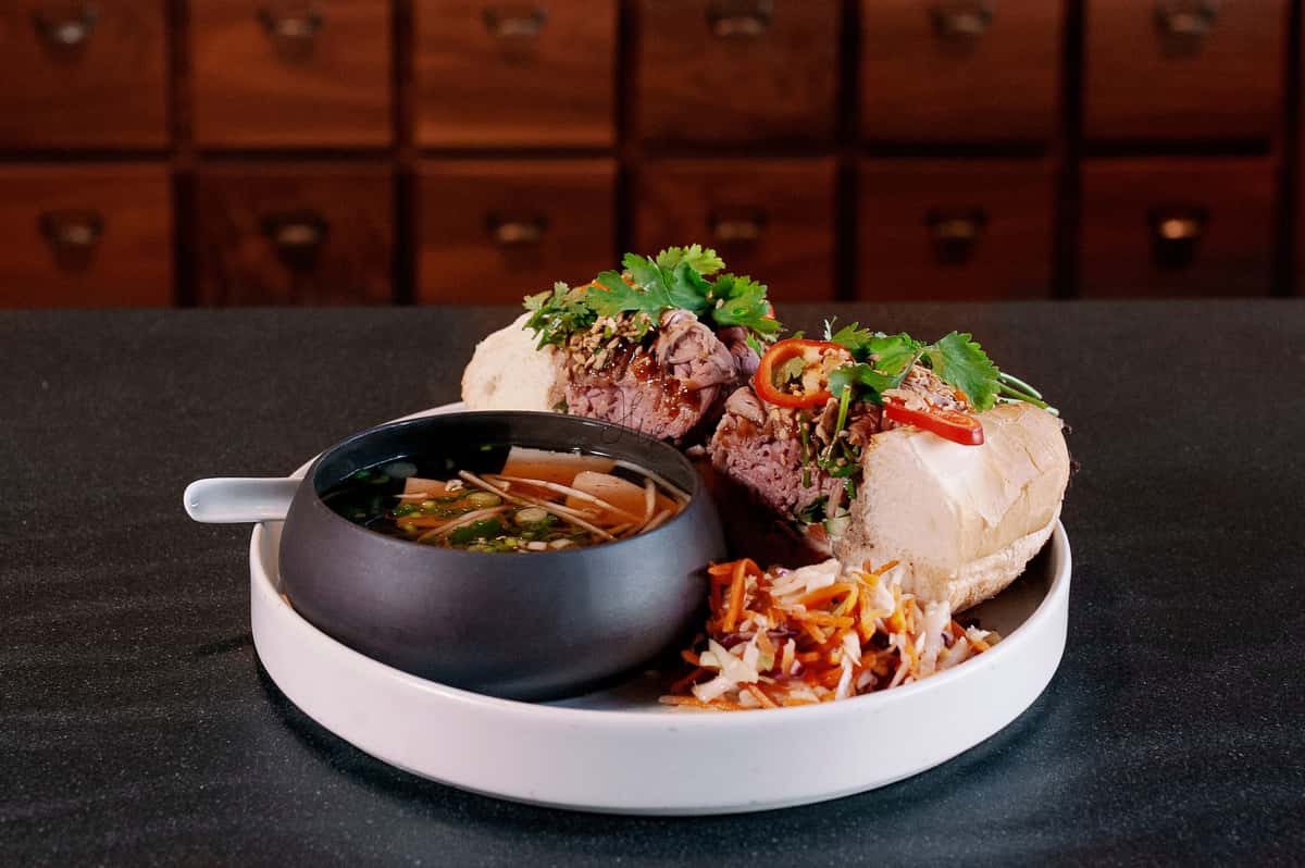 Five Spice Roasted Beef, Pate, Shallot Aioli, Basil and Cilantro, Cucumbers and Pickles, Pho Au Jus