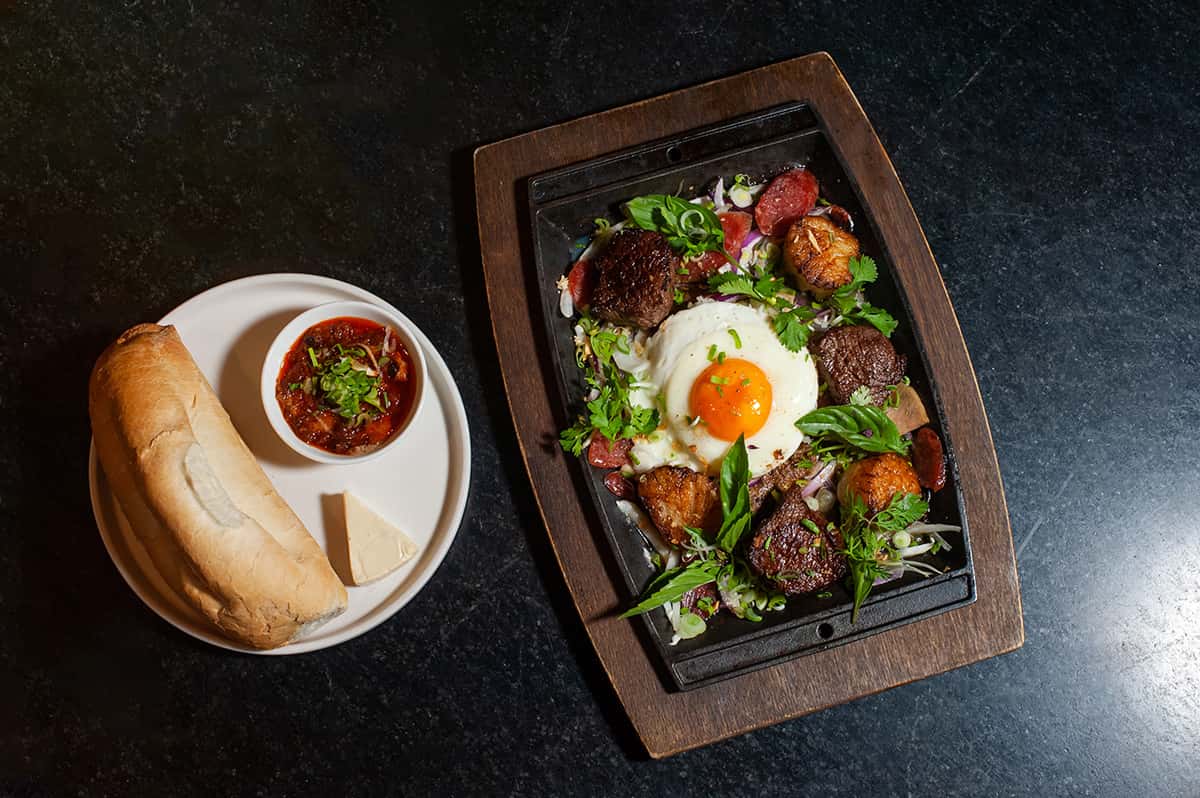 Caramelized Onions and Herbs, Pate, Lap Xuongm Gio Sausage, Fried Egg, Banh Mi and Rice