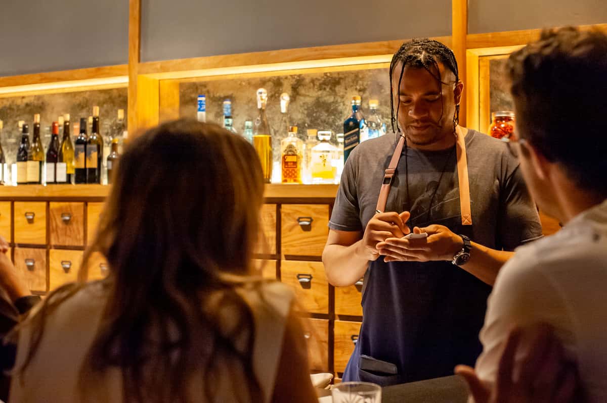 Our waiter taking customer's order