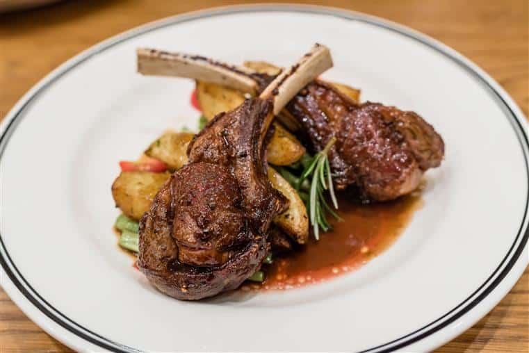 KABOB CHUPAN (LAMB CHOPS): Lamb loin chops with the bone marinated in our special marinade threaded on skewers with pieces of vegetables charbroiled. Served with traditionally seasoned browned rice.