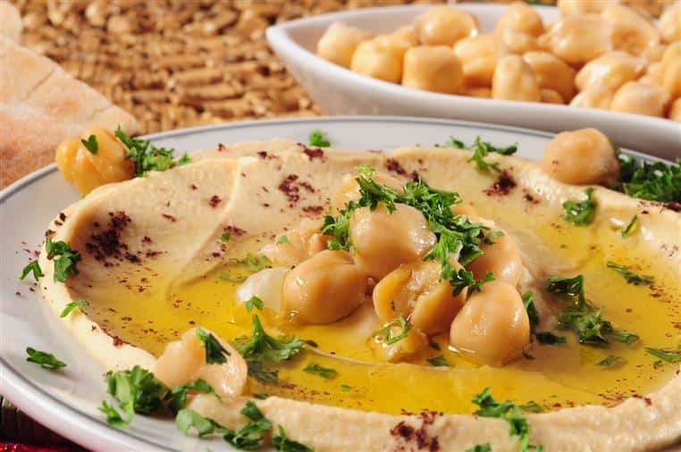bowl of hummus topped with chickpeas