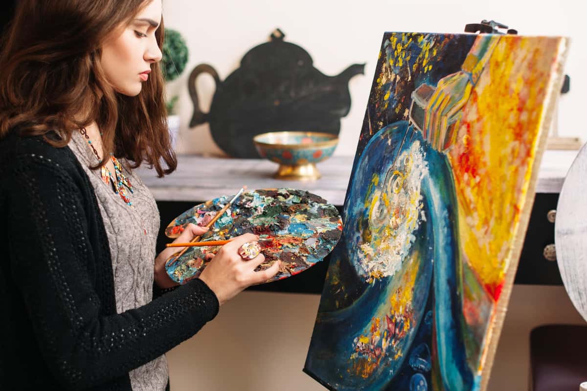 a woman painting
