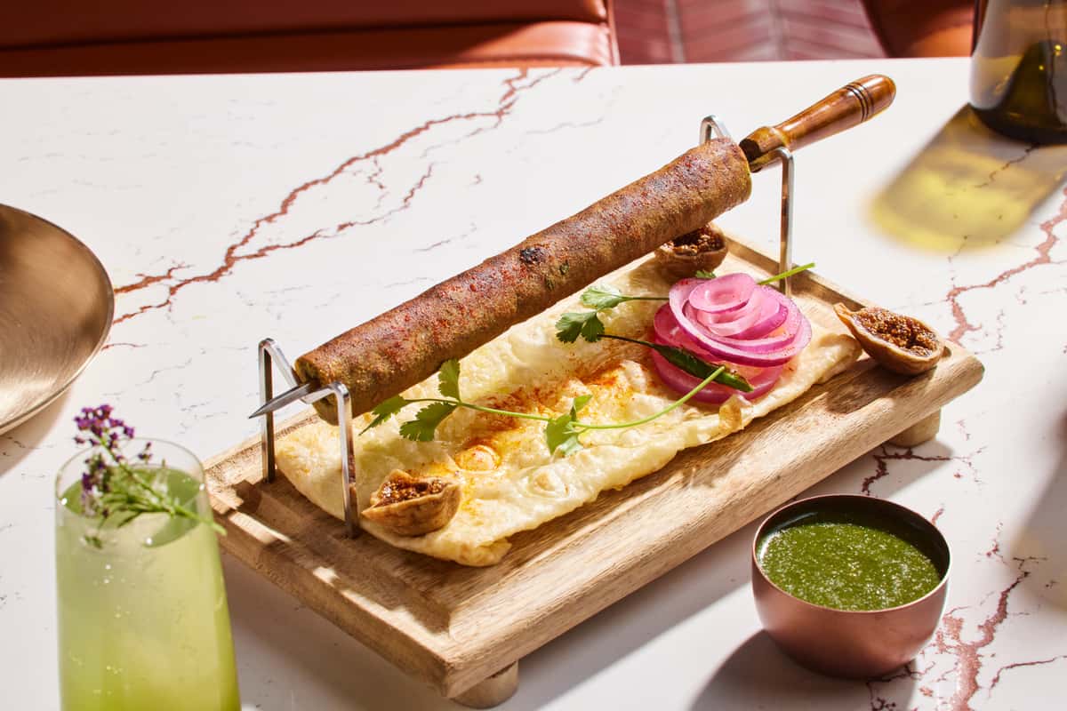 Indian catering dishes from Pippal Emeryville including Paneer Makhani, Asami Vegetable Curry, Chicken Saoji, and Beetroot Kebab