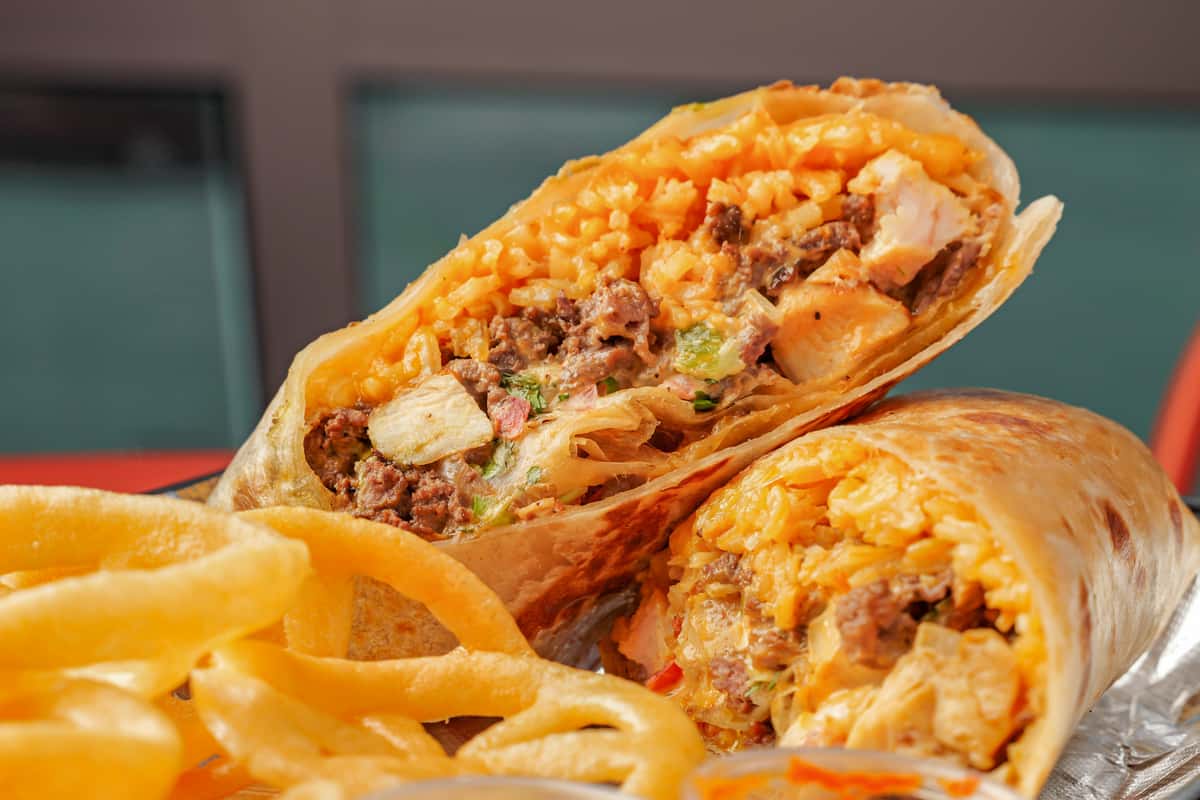 A delicious Chick and Steak Burrito served at Señor Burrito Company