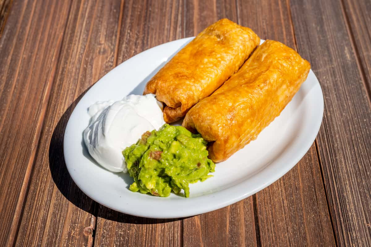 Chimichanga, Chimichanga is a deep-fried burrito that is po…