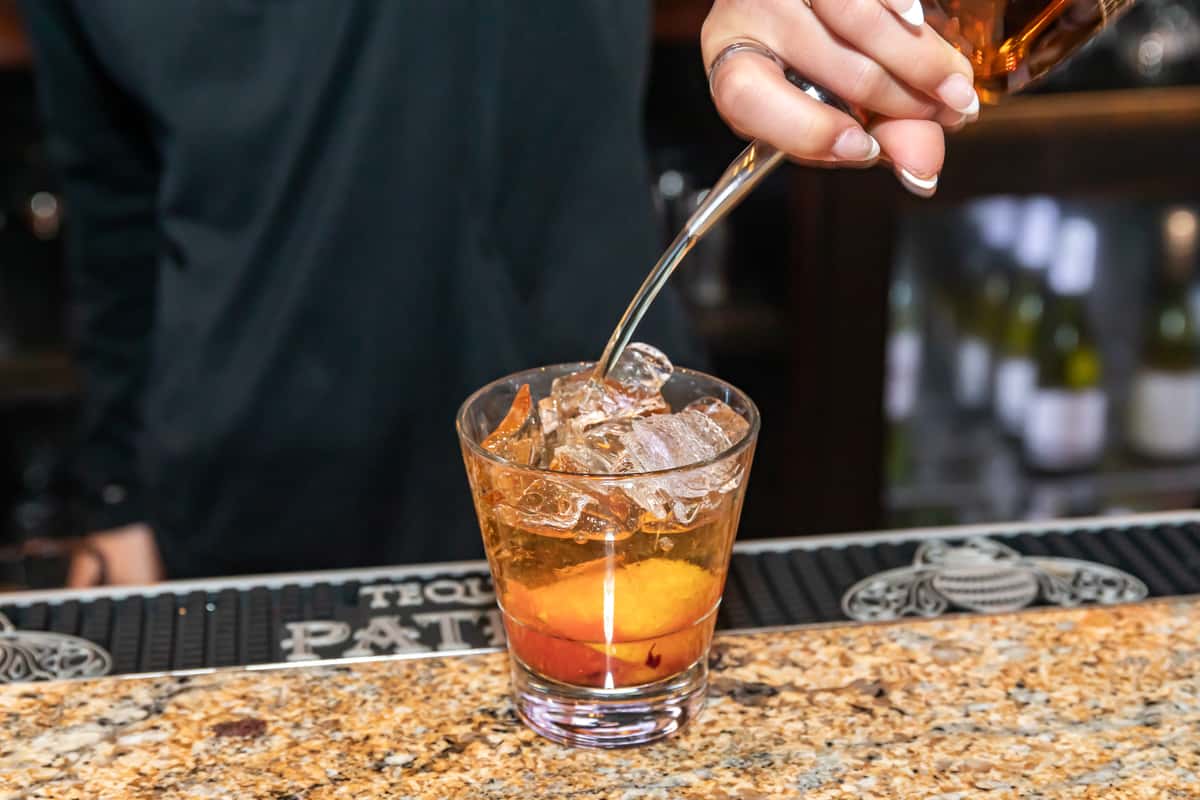 Bartender pouring a drink