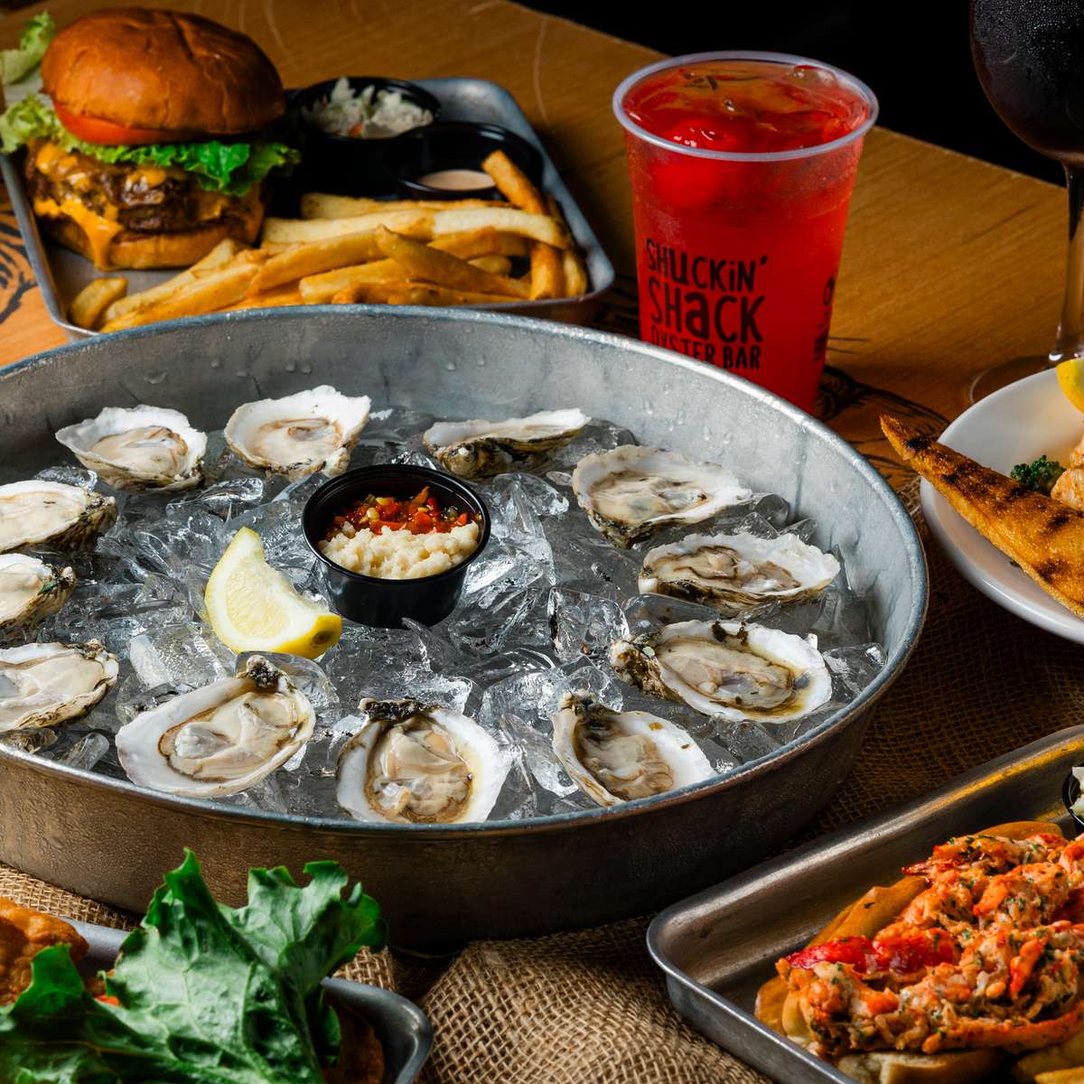 Oysters with complimenting sides and cocktails