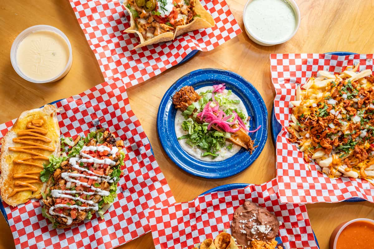 Top down view of multiple dishes from Luchi & Joey's
