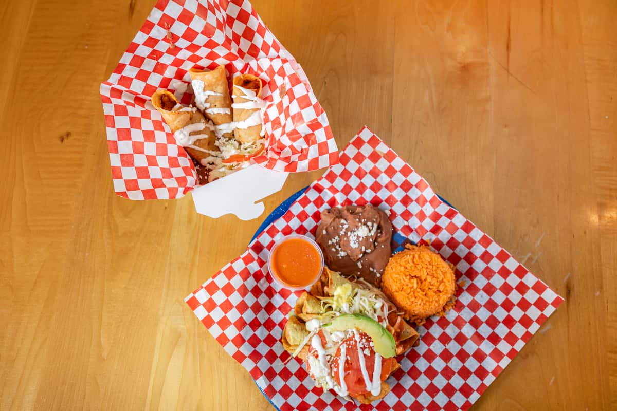 Top down view of two baskets of Chicken Flautas