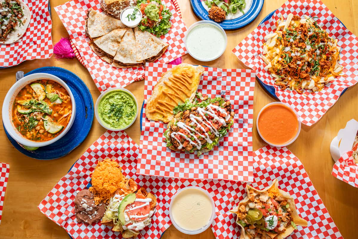 Top down view of multiple dishes from Luchi & Joey's