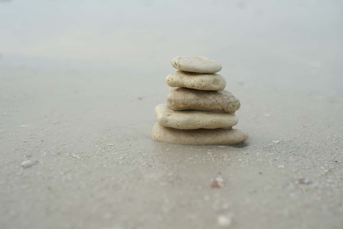 Stones on beach sand