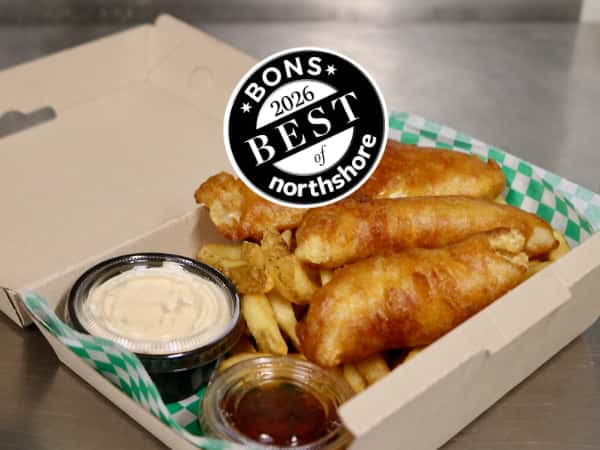 Fish & Chips, 3 pieces of fried haddock, fries, sauce in a takeout container
