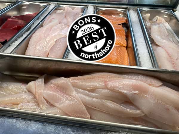 Seafood market case with haddock, sole, salmon on ice