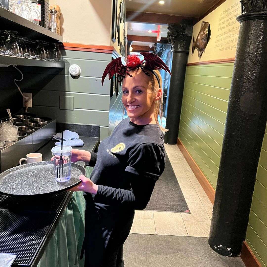 Turner's team member in kitchen with bat ears on head