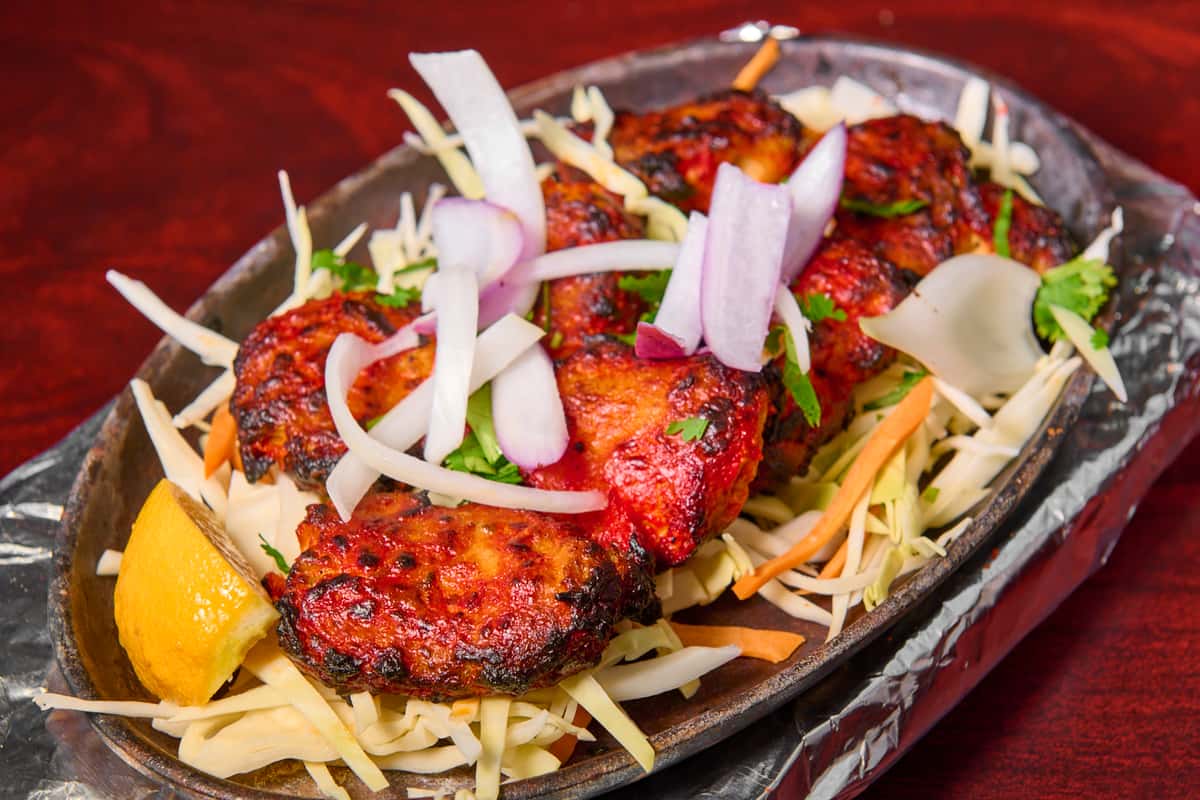 Pahadi soya chaap at Dhaba Express Parsippany NJ, smoky grilled soy chaap in bold North Indian spices served with onions and lemon