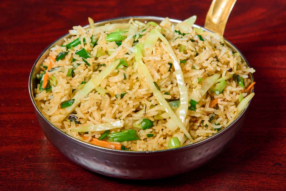 Veg fried rice at Dhaba Express in Parsippany, NJ, a flavorful Indo-Chinese dish with stir-fried rice, vegetables, and fresh herbs