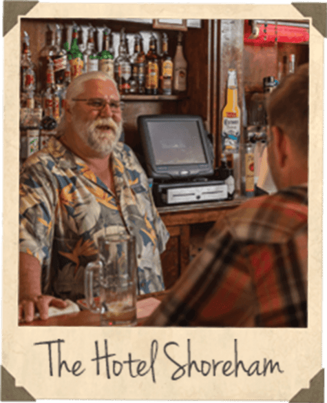 The Hotel Shoreham - Employee assisting a customer at the bar