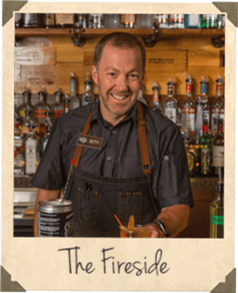 The Fireside - Employee smiling for the camera