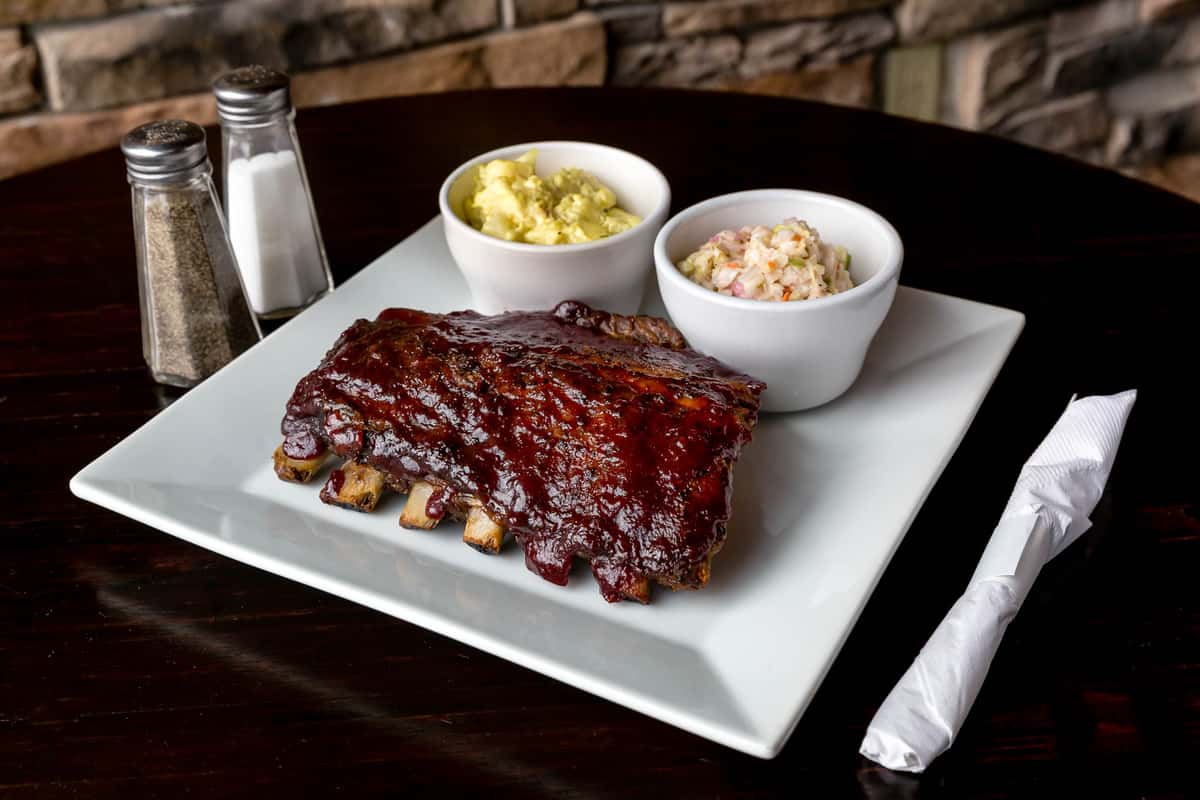Neil St. Blues smoked ribs with homemade potato salad and coleslaw