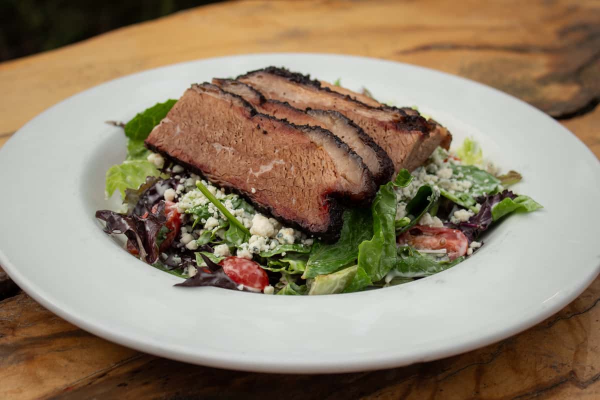Salad with slice of brisket
