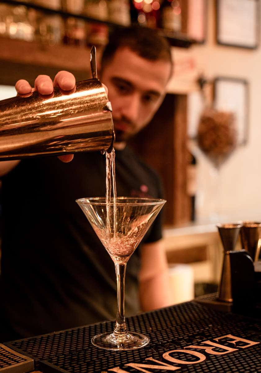 pouring cocktail