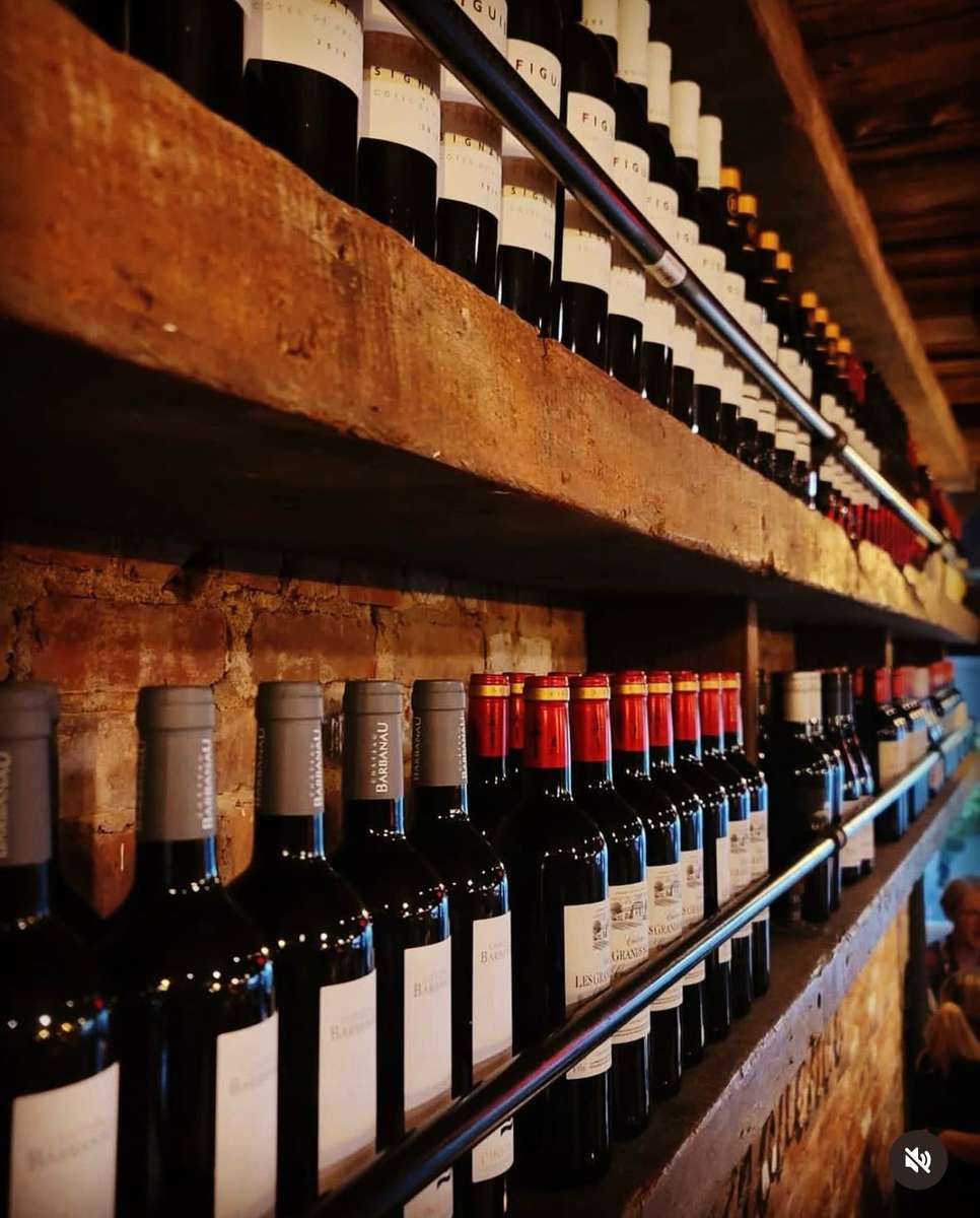 Wine bottle on a wood shelve