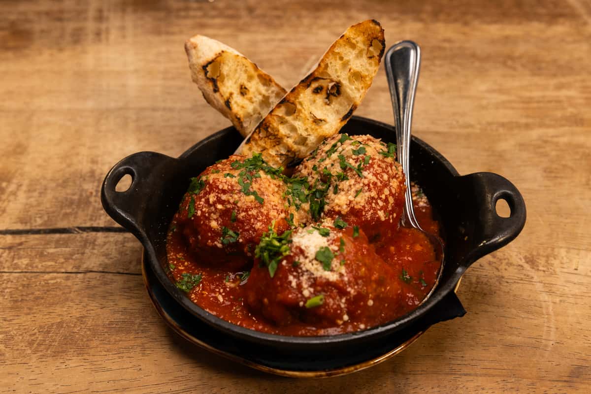 Meatballs with marinara and bread sticks