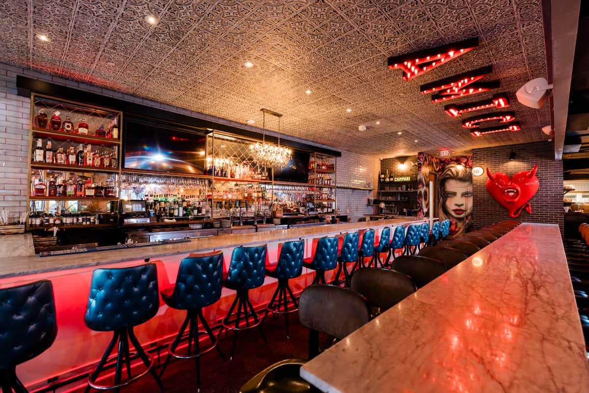 Bar counter and seating inside Forbici Tampa