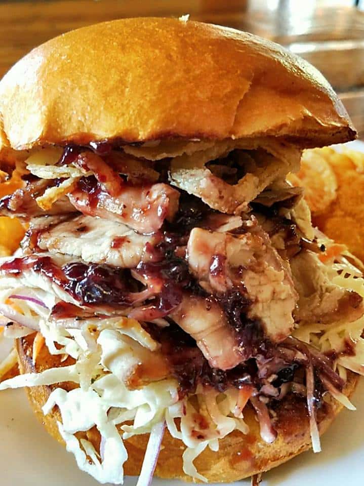 pulled pork sandwich with a coleslaw