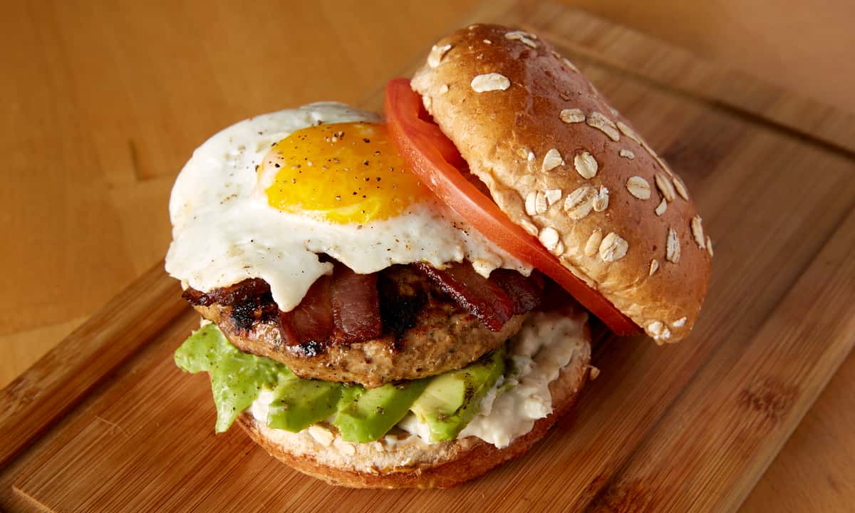 Burger with egg and tomato