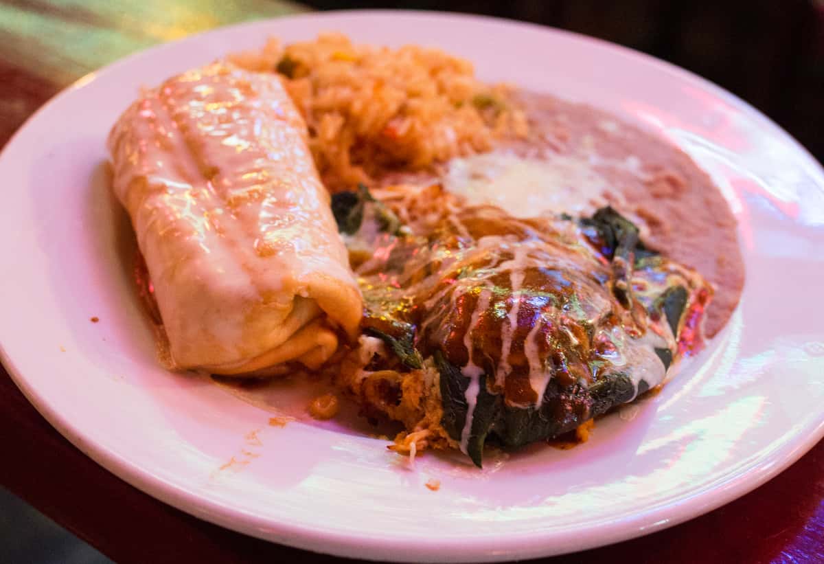 One Beef or Chicken Chile Poblano, Covered with Cheese, Enchilada Sauce. Served with Rice & Beans.