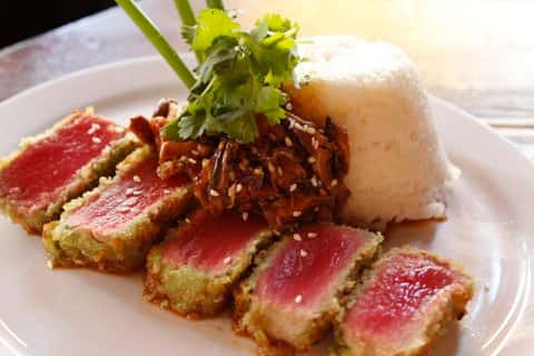 Crispy Wasabi Tuna: Wasabi and panko-crusted ahi tuna steak* with sesame-shiitake salsa and served with jasmine rice.