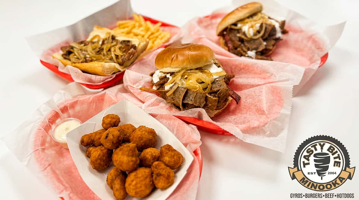 Gyro sandwich, Italian beef sandwich with fries, and fried mushrooms.