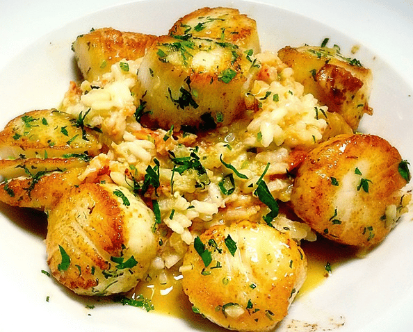 LIMONCELLO SCALLOPS: seared scallops, lobster risotto, limoncello glaze 