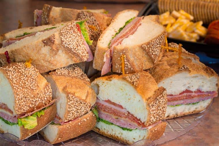  sandwiches with a variety of deli meats