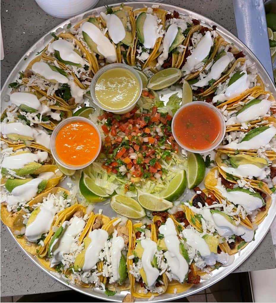 24 Mexican street tacos with your choice of meat, fresh onions & cilantro on mini corn tortilla with fresh limes on the side. This DELUXE platter also comes with fresh avocado slices, queso fresco, & sour cream on top of your tacos. All of our taco platters come with your choice of our complimentary homemade salsas on the side