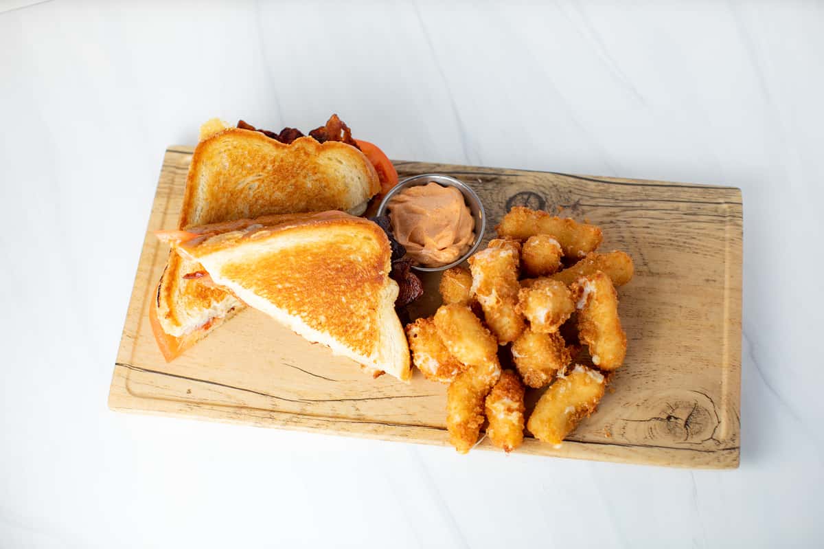 bacon, cheese, tomato sandwich and tots