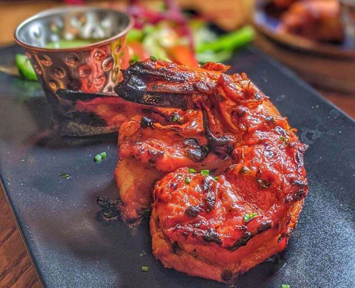 2 pcs. Wild catch jumbo tiger prawns infused in saffron Tandoori masala and chargrilled