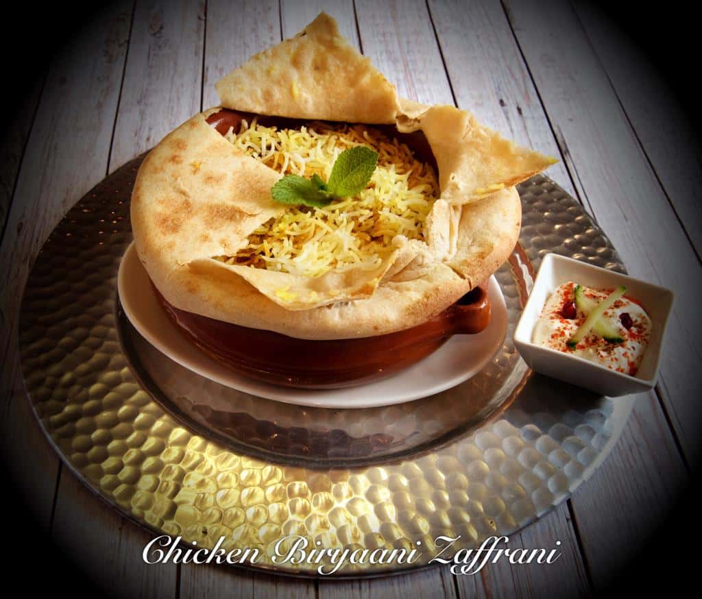 Tender chicken chunks and finest basmati rice cooked in oven with saffron and biryani spice mix and mint. Served with yogurt dip