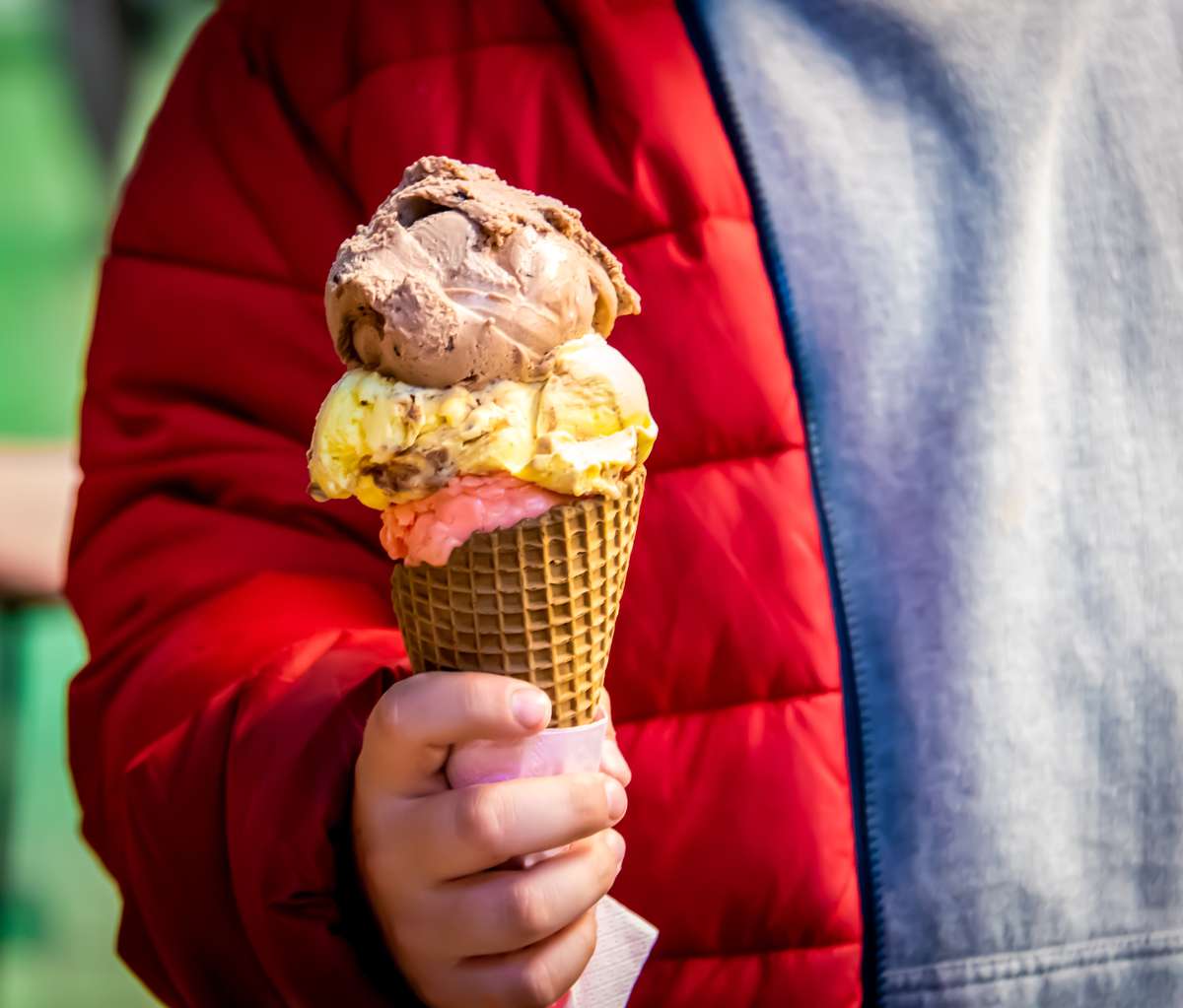 child holding ice cream