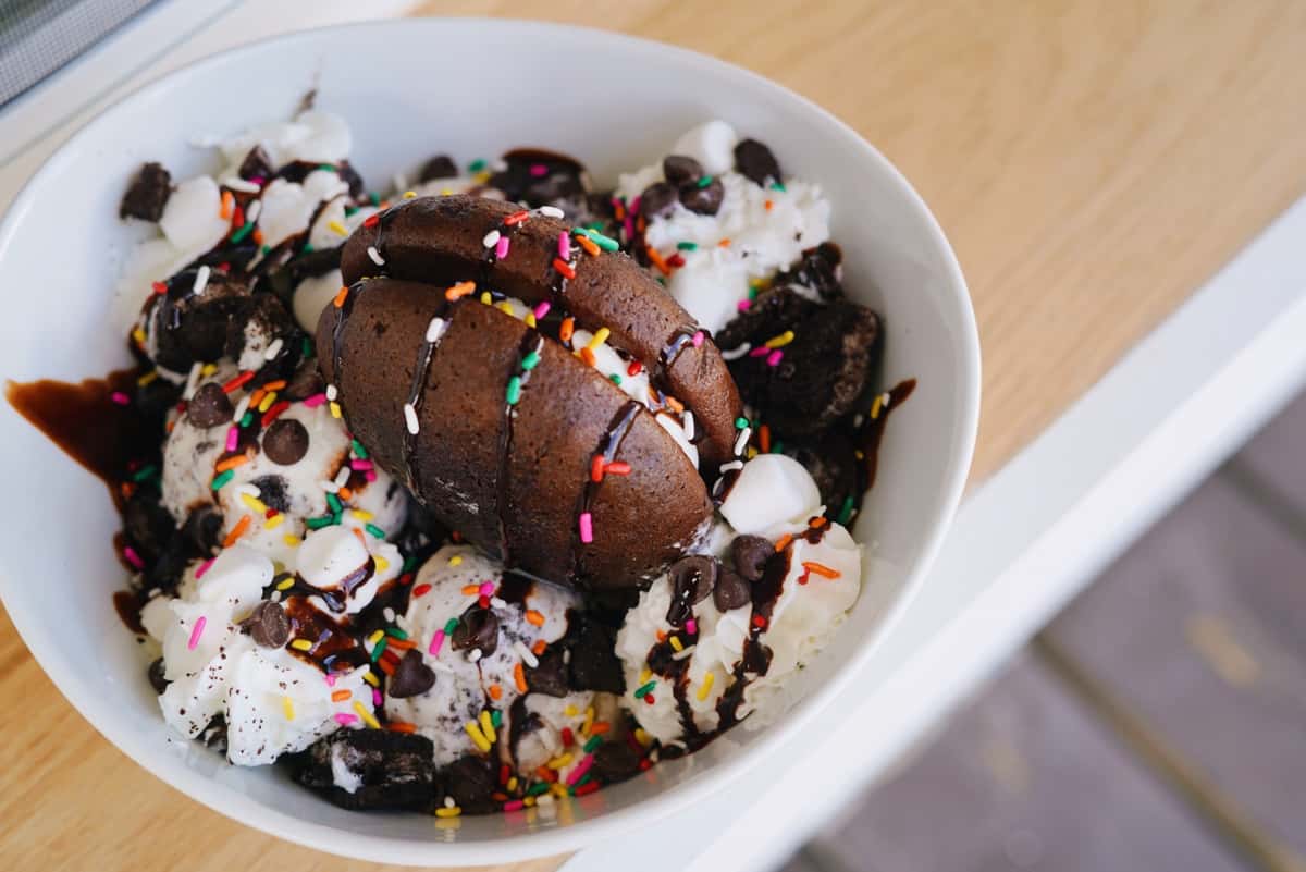 Ice cream with sprinkles and chocolate sauce