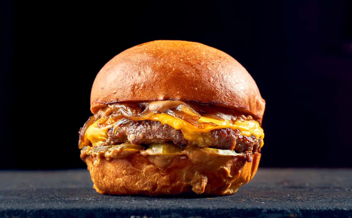 Juicy Burger with cheese and caramelized onions