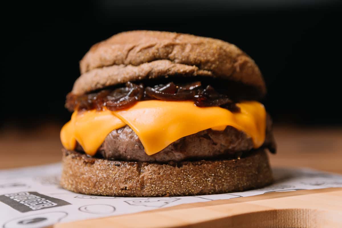 Burger with cheddar and caramelized onions