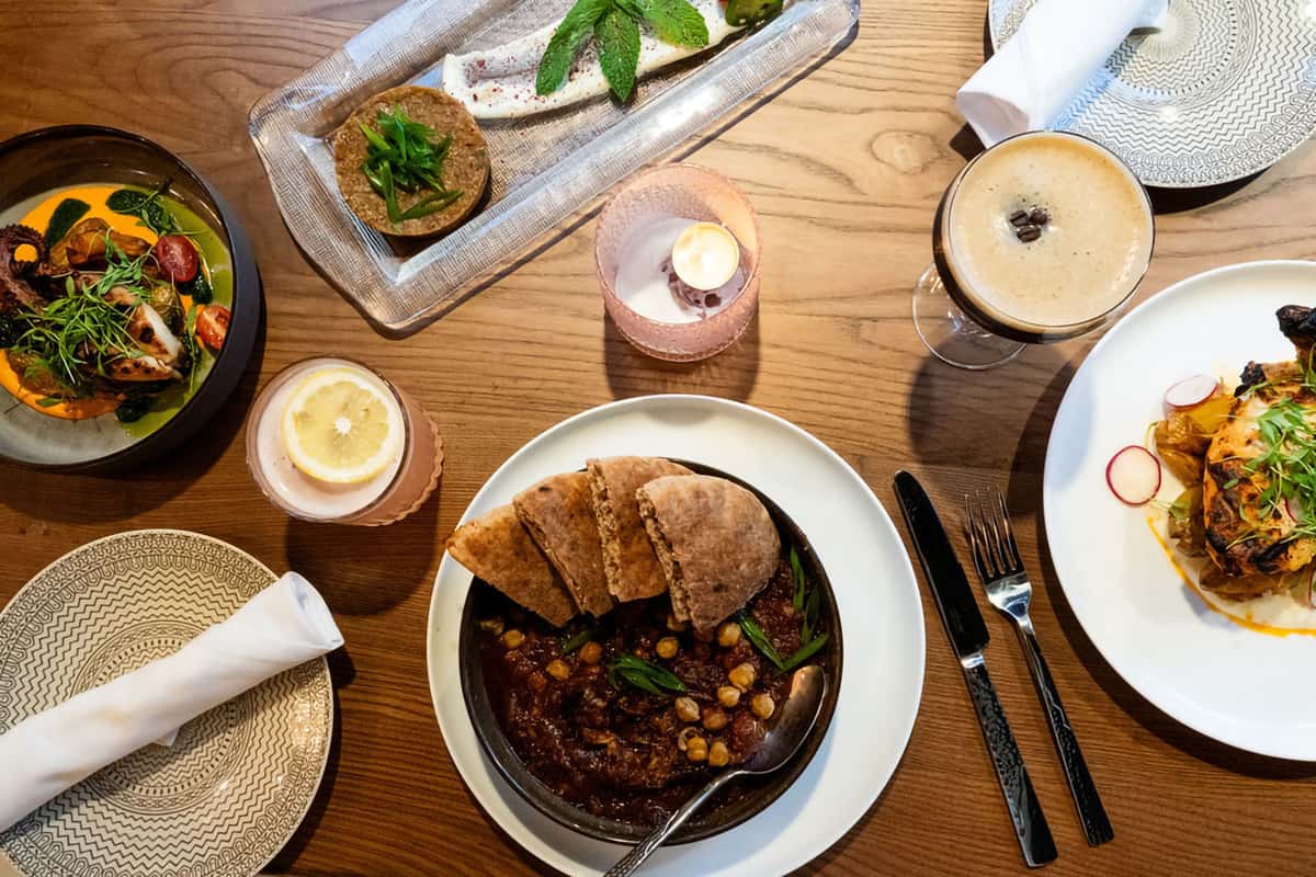 An array of Mediterranean inspired entrees and appetizers at Bey