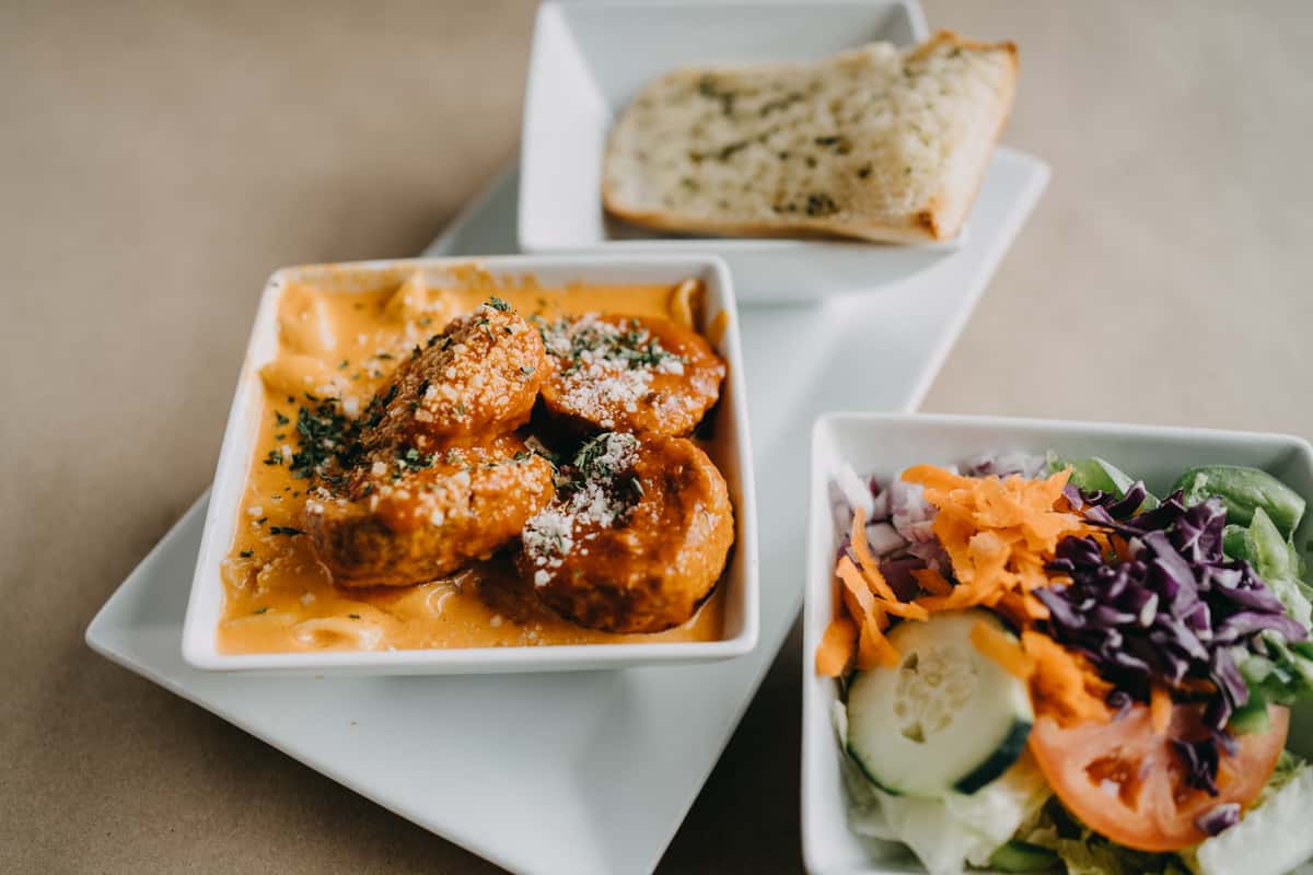 Pasta with Sauce, Salad, and Garlic Bread