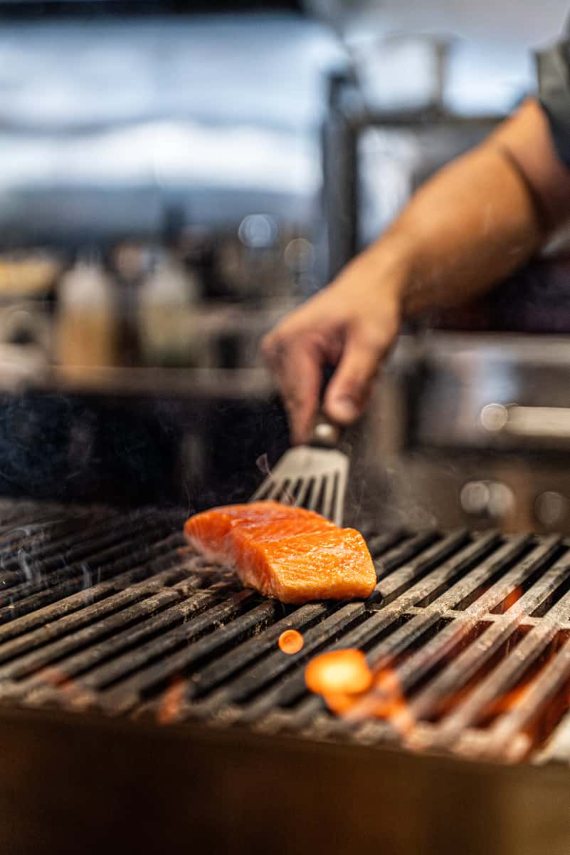 salmon filet on wood fired grill