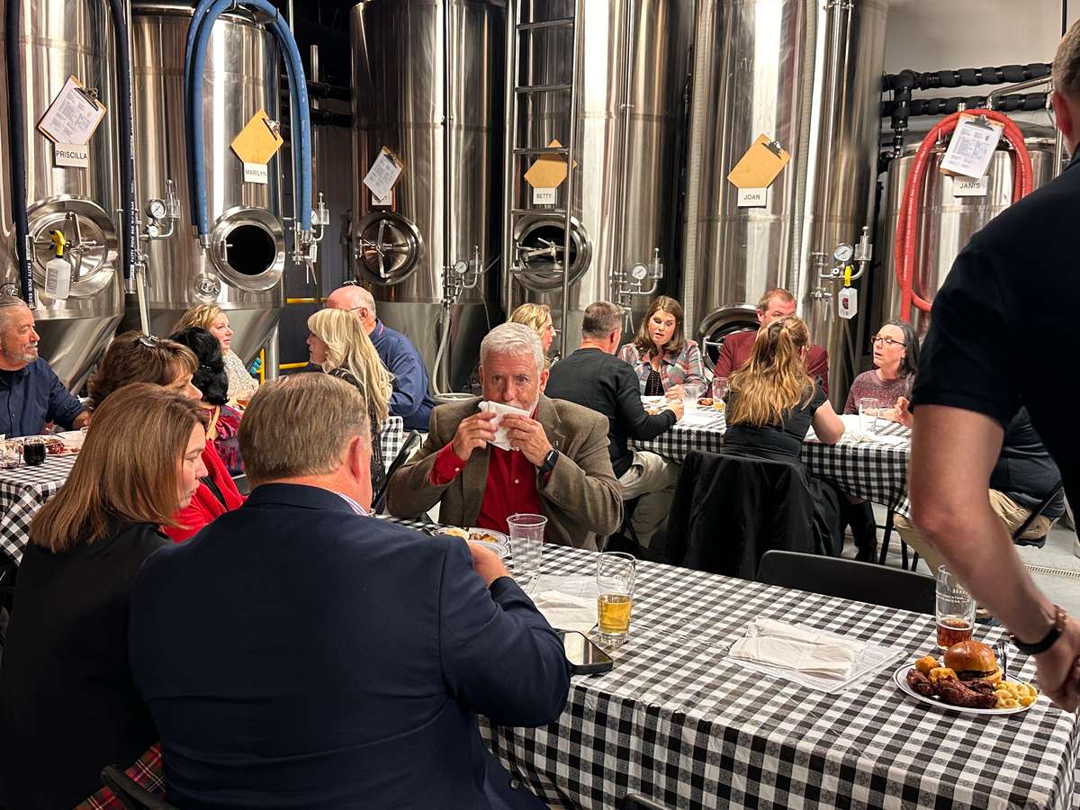 Corporate dinner among the brewing tanks at Schoolhouse Brewing