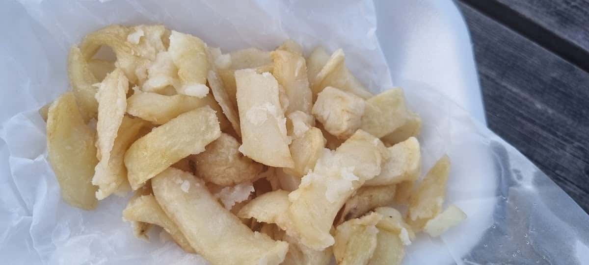 Fresh pieces of prepared fish ready for cooking at Blue Bay fish and chip shop.