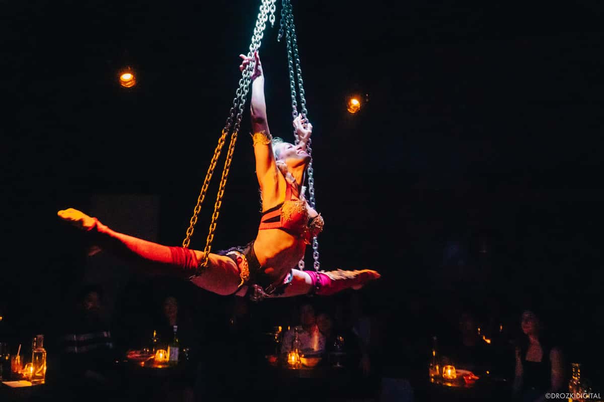 performing artist suspended in air